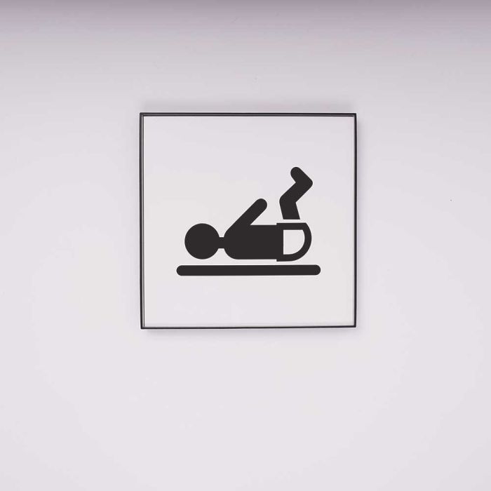 Slankt og let designet Toiletskilt med Pulse piktogram i sort